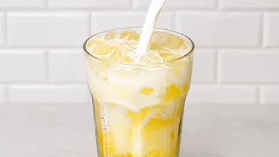 Fanta de naranja con leche